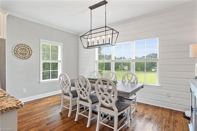 3922 Tam O Shanter Rd, Kernersville, NC 27284 - dining area with a chandelier, ornamental molding, and dark wood-type flooring
