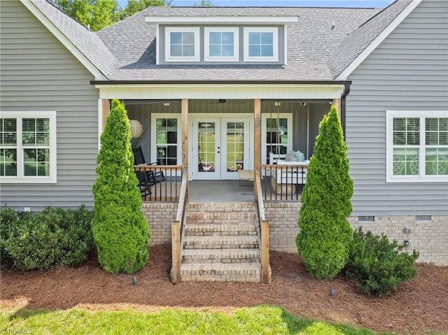 3922 Tam O Shanter Rd, Kernersville, NC 27284 - view of exterior entry featuring french doors, covered porch, and roof with shingles