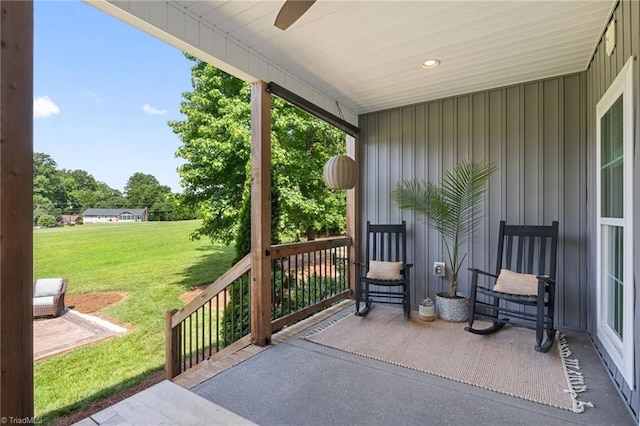3922 Tam O Shanter Rd, Kernersville, NC 27284 - porch featuring ceiling fan and a yard