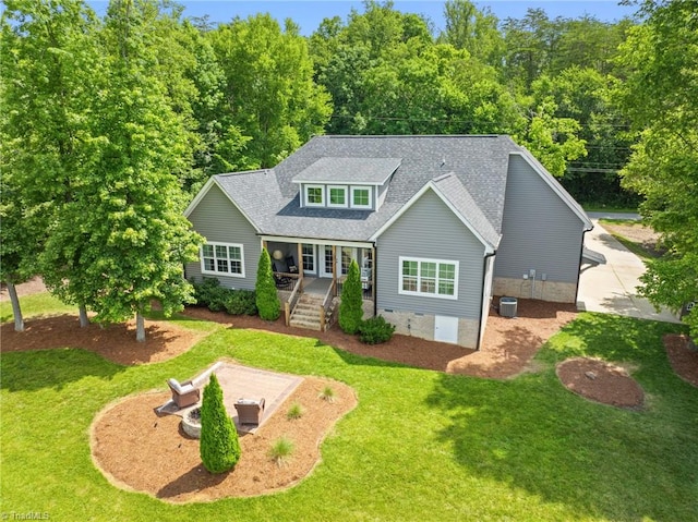 3922 Tam O Shanter Rd, Kernersville, NC 27284 - view of front of home with a front lawn, a shingled roof, crawl space, and a porch