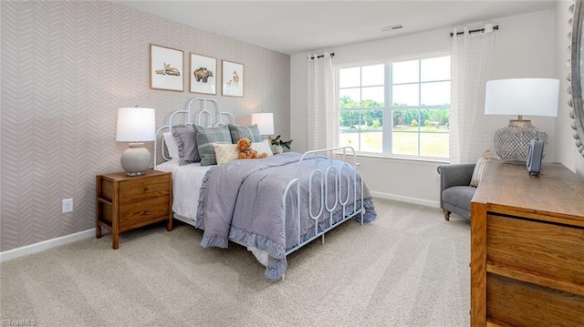 6617 Grogan Hill Rd, Whitsett, NC 27249 - bedroom featuring wallpapered walls, baseboards, and carpet
