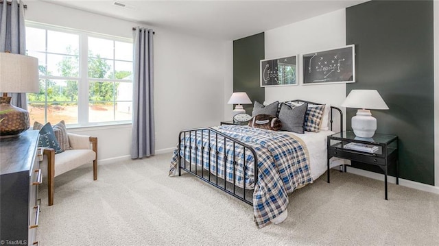 6617 Grogan Hill Rd, Whitsett, NC 27249 - bedroom with carpet flooring and baseboards