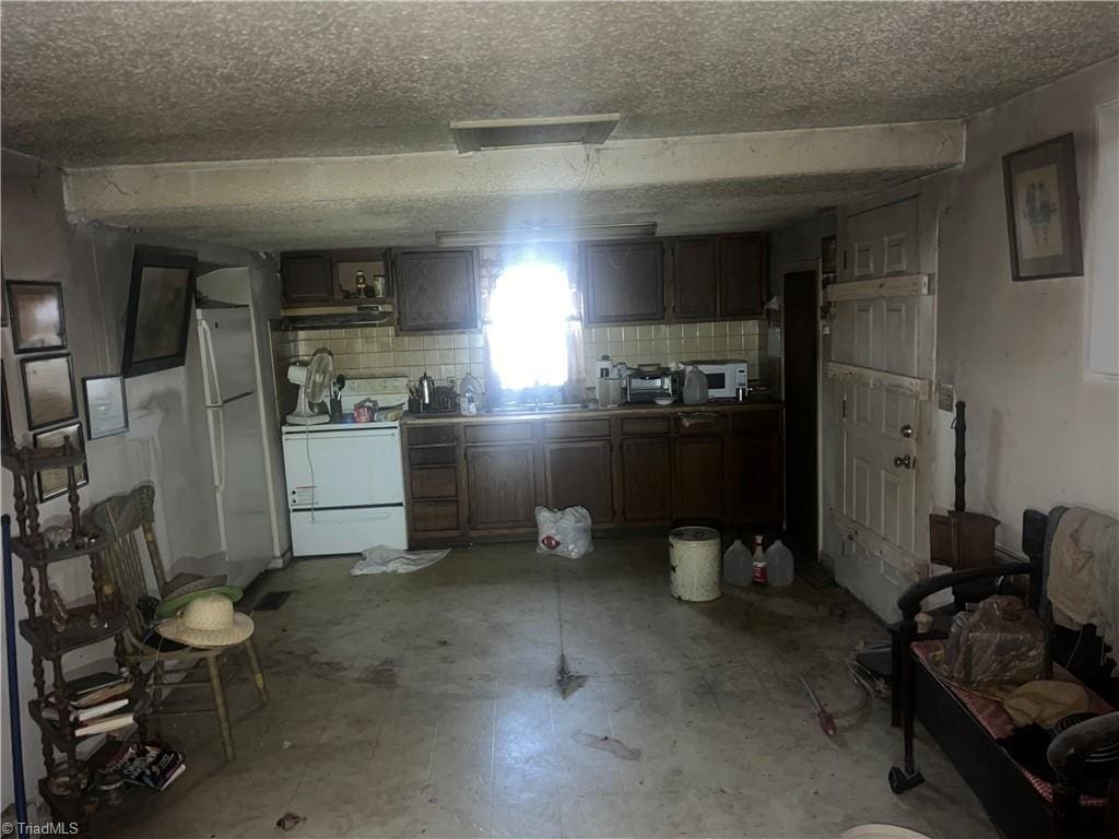 interior space with white refrigerator