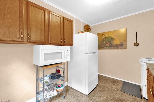 109 Easy St, Providence, NC 27315 - kitchen with white appliances, brown cabinets, tile patterned floors, ornamental molding, and baseboards