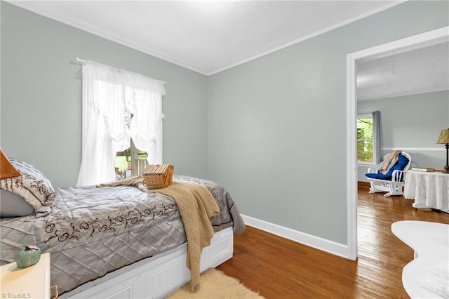 109 Easy St, Providence, NC 27315 - bedroom featuring wood finished floors, ornamental molding, and baseboards