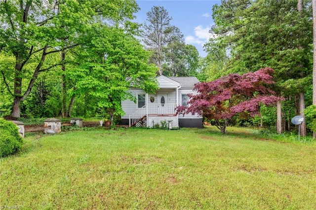 109 Easy St, Providence, NC 27315 - view of green lawn with a porch