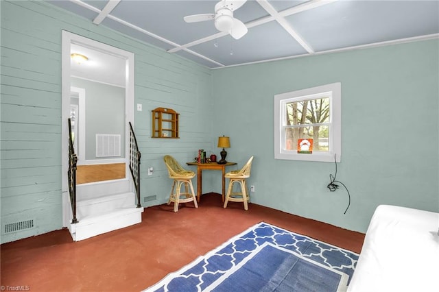 109 Easy St, Providence, NC 27315 - bedroom with ceiling fan, carpet flooring, and wood walls