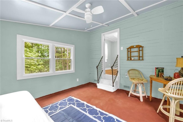 109 Easy St, Providence, NC 27315 - bedroom featuring multiple windows, wooden walls, and a ceiling fan
