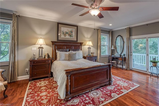 bedroom with hardwood / wood-style flooring, crown molding, and access to exterior