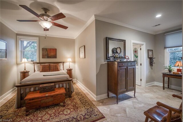 bedroom featuring crown molding