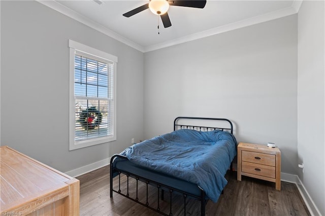 bedroom with ceiling fan, dark hardwood / wood-style flooring, and ornamental molding