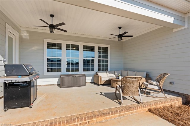 view of patio / terrace with an outdoor living space, area for grilling, and ceiling fan