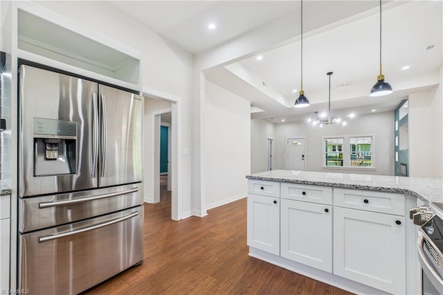 1924 E 25th St, Winston-Salem, NC 27105 - kitchen with appliances with stainless steel finishes, white cabinets, dark wood finished floors, light stone countertops, and baseboards