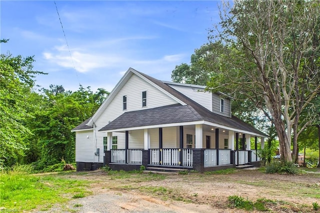 1924 E 25th St, Winston-Salem, NC 27105 - farmhouse featuring a porch and roof with shingles