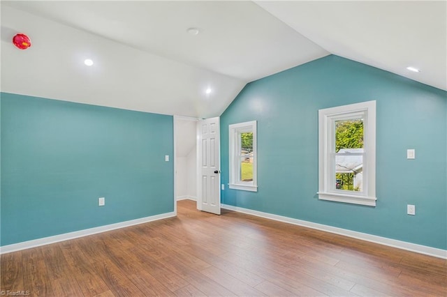 1924 E 25th St, Winston-Salem, NC 27105 - bonus room with wood finished floors, vaulted ceiling, and baseboards
