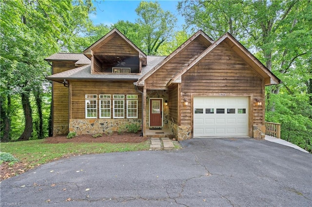 833 E Country Club Rd, Mount Airy, NC 27030 - view of front of property featuring driveway, stone siding, and an attached garage