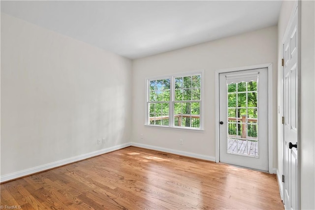 833 E Country Club Rd, Mount Airy, NC 27030 - empty room with light wood-style floors and baseboards