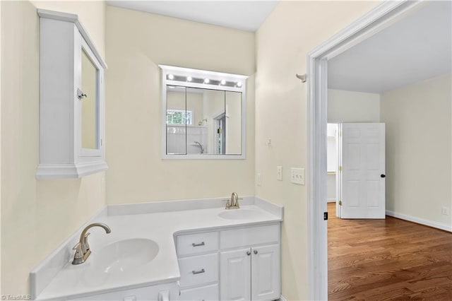 833 E Country Club Rd, Mount Airy, NC 27030 - bathroom featuring double vanity and wood finished floors