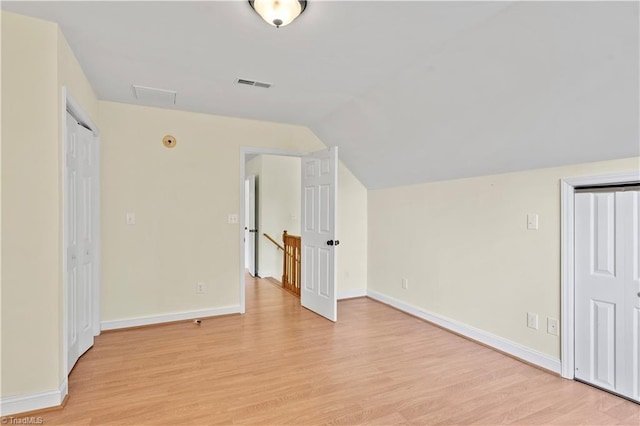 833 E Country Club Rd, Mount Airy, NC 27030 - additional living space with light wood-type flooring, vaulted ceiling, and baseboards