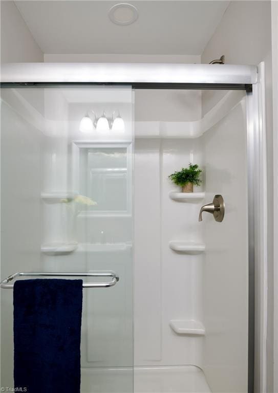 5425 Davis Rd, Walkertown, NC 27105 - full bath featuring a shower stall