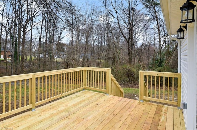 5425 Davis Rd, Walkertown, NC 27105 - wooden deck featuring view of wooded area