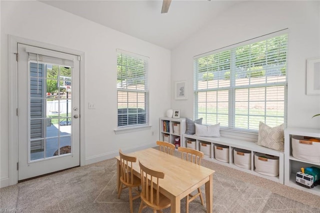 rec room with carpet floors, ceiling fan, and lofted ceiling