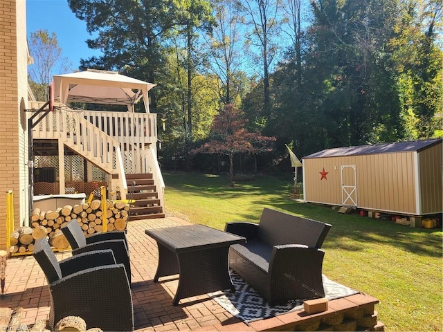 view of patio with a storage unit and an outdoor hangout area