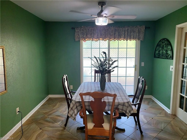 dining area featuring ceiling fan