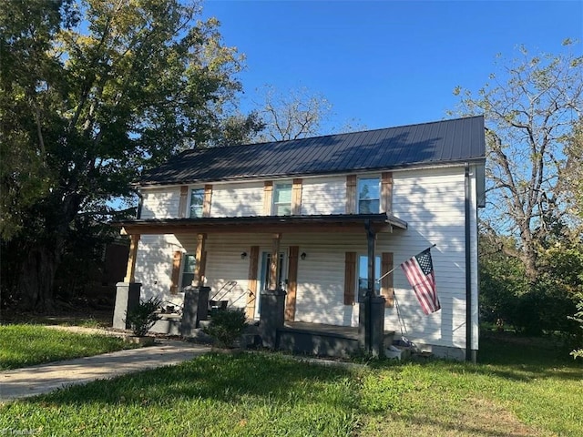 view of front of house featuring a porch and a front lawn