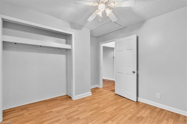1655 Oakleigh Rd, Mcleansville, NC 27301 - unfurnished bedroom featuring attic access, light wood-type flooring, and ceiling fan