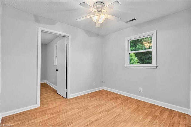 1655 Oakleigh Rd, Mcleansville, NC 27301 - spare room featuring light wood-style flooring and a ceiling fan