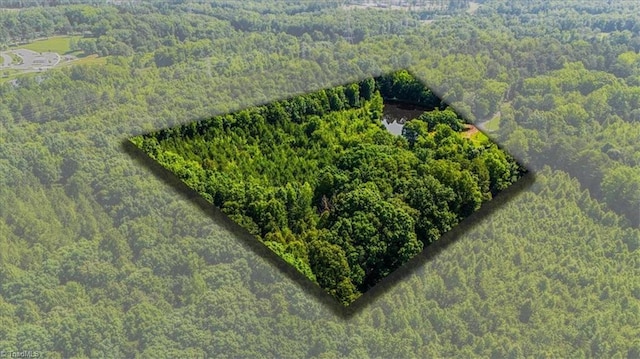 1655 Oakleigh Rd, Mcleansville, NC 27301 - drone / aerial view of a heavily wooded area
