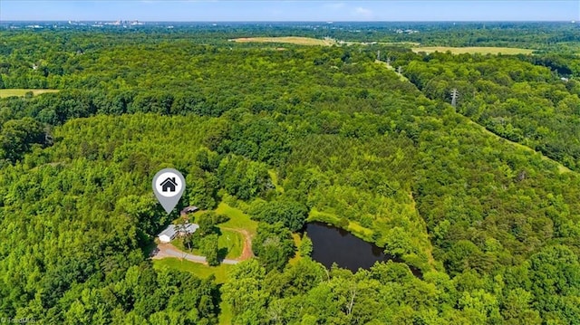 1655 Oakleigh Rd, Mcleansville, NC 27301 - drone / aerial view of a forest and a large body of water