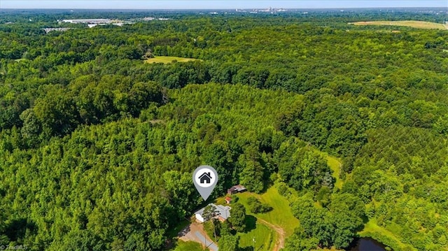 1655 Oakleigh Rd, Mcleansville, NC 27301 - aerial overview of property's location featuring a heavily wooded area