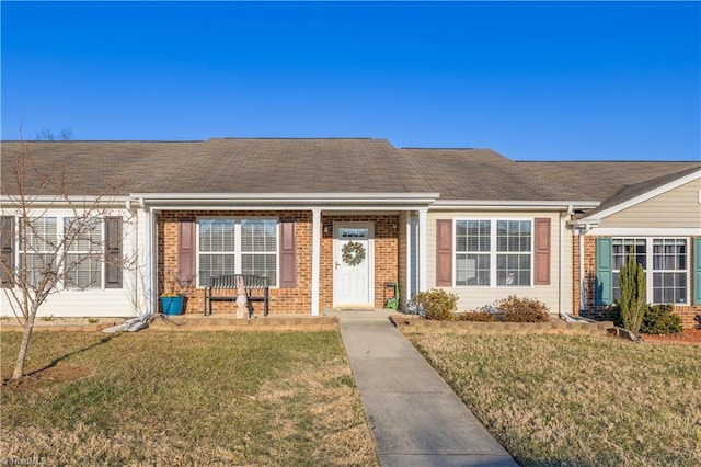 ranch-style house with a front lawn