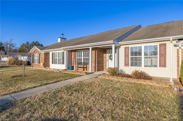 single story home with a front yard