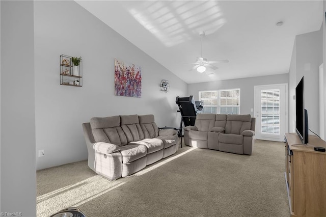 living room featuring ceiling fan, light colored carpet, and lofted ceiling