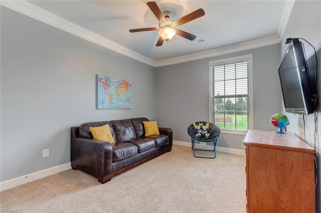 113 Crestbourne Ct, Stokesdale, NC 27357 - living room with light colored carpet, ornamental molding, and ceiling fan