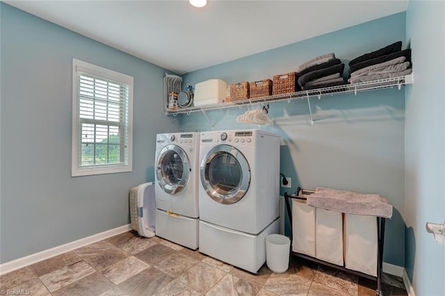 113 Crestbourne Ct, Stokesdale, NC 27357 - laundry room featuring washer and dryer and light stone finish floors