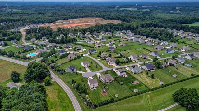 113 Crestbourne Ct, Stokesdale, NC 27357 - aerial view of property and surrounding area with a heavily wooded area