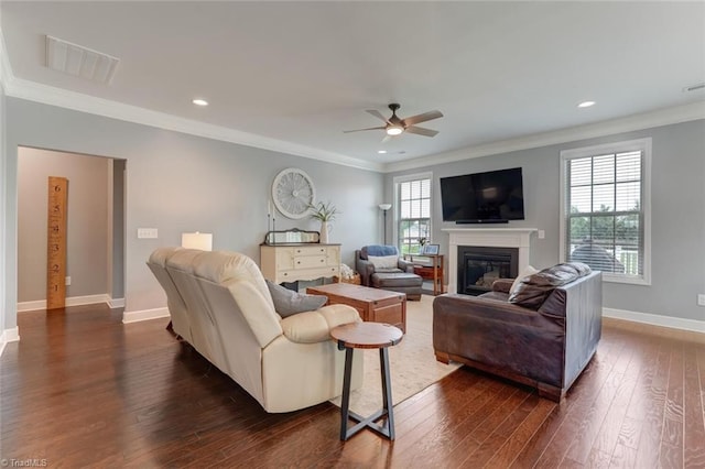 113 Crestbourne Ct, Stokesdale, NC 27357 - living area featuring ceiling fan, a glass covered fireplace, dark wood-type flooring, crown molding, and recessed lighting