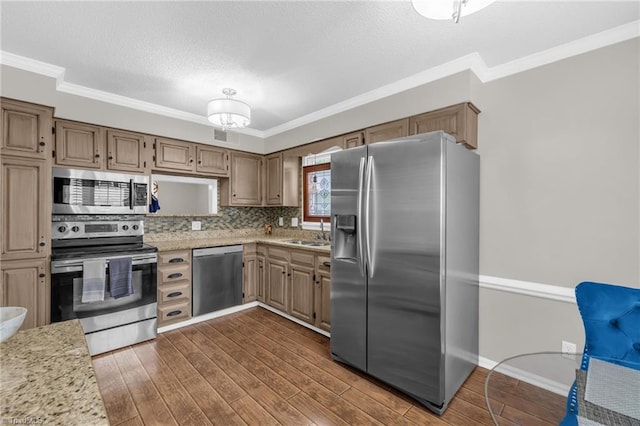 5660 W Market St Unit A, Greensboro, NC 27409 - kitchen with stainless steel appliances, dark wood-style floors, a sink, crown molding, and a textured ceiling