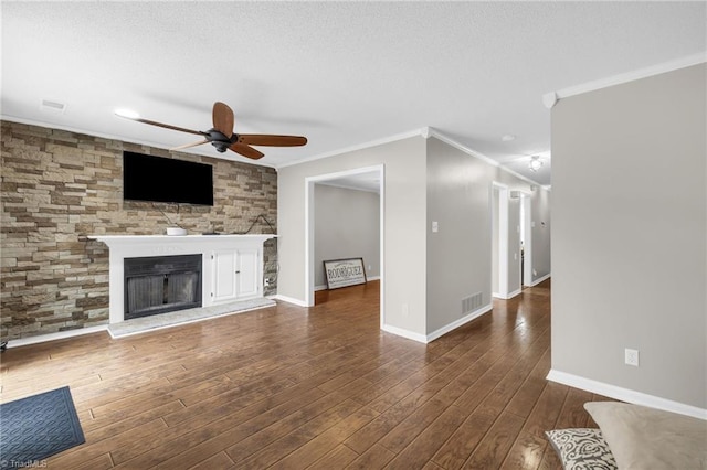 5660 W Market St Unit A, Greensboro, NC 27409 - unfurnished living room with ceiling fan, crown molding, a fireplace, baseboards, and wood finished floors