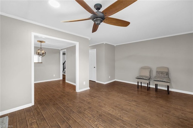 5660 W Market St Unit A, Greensboro, NC 27409 - spare room with ornamental molding, baseboards, wood finished floors, a ceiling fan, and a chandelier