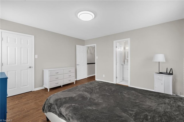 5660 W Market St Unit A, Greensboro, NC 27409 - bedroom featuring wood finished floors and baseboards