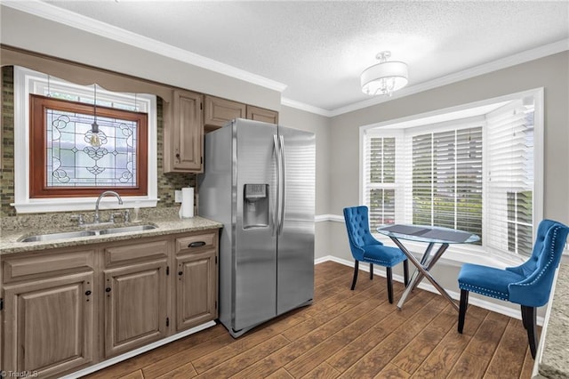 5660 W Market St Unit A, Greensboro, NC 27409 - kitchen with stainless steel fridge with ice dispenser, a sink, dark wood-type flooring, baseboards, and a textured ceiling