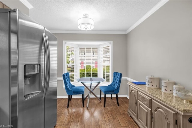 5660 W Market St Unit A, Greensboro, NC 27409 - sitting room with hardwood / wood-style flooring, a textured ceiling, baseboards, and ornamental molding
