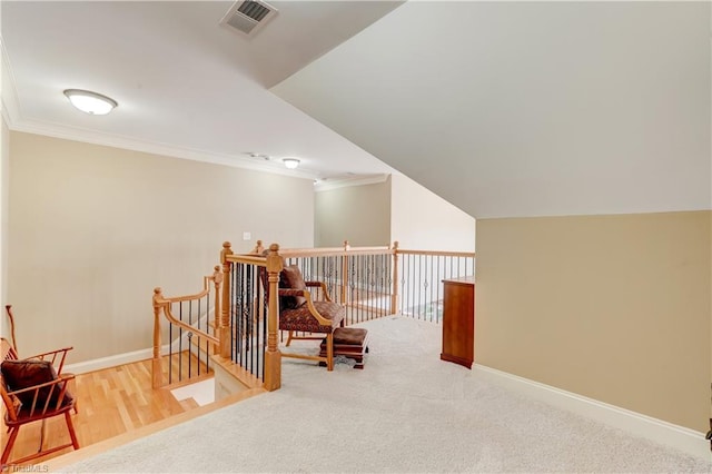 additional living space with wood-type flooring and lofted ceiling