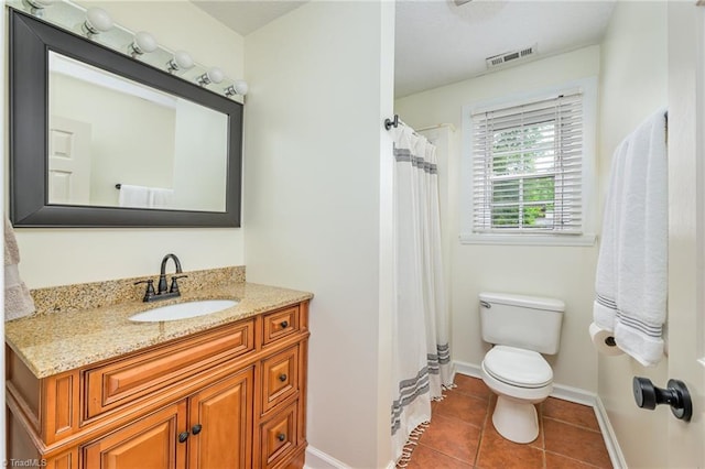 1229 Martin St, Winston-Salem, NC 27103 - bathroom with toilet, vanity, tile patterned flooring, baseboards, and curtained shower