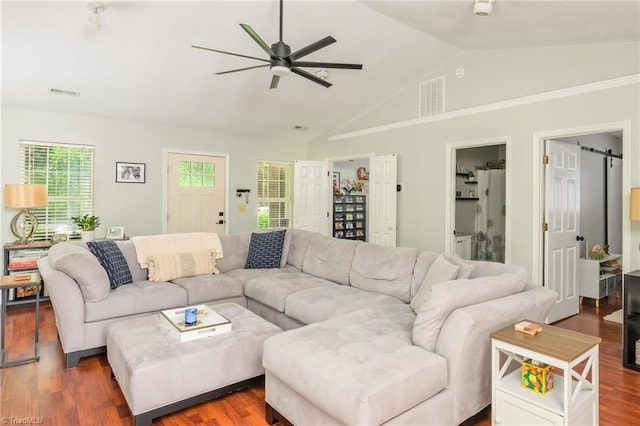 1229 Martin St, Winston-Salem, NC 27103 - living area with a ceiling fan, wood finished floors, and high vaulted ceiling